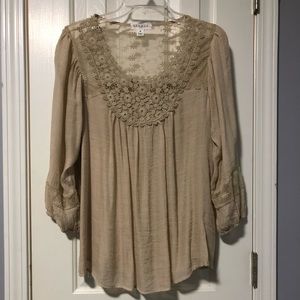 Tan colored sheer top. Size M.